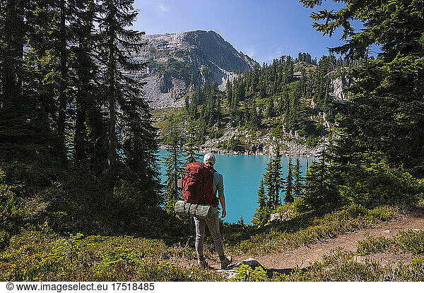 Female backpacking in the north cascade mountains