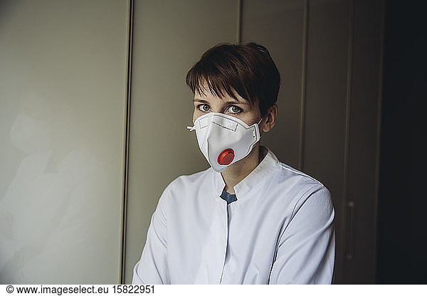 Female doctor wearing FFP3 mask