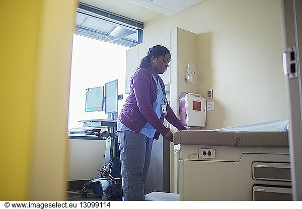 Female doctor working in medical room