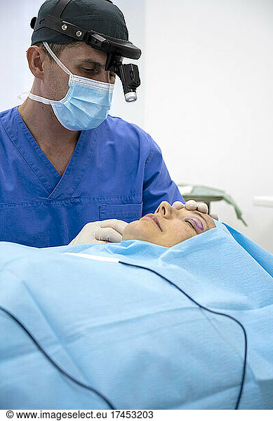 Female patient lying on a stretcher in an operating room