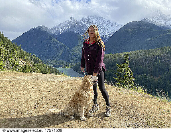 Female posing with dog above Diablo Lake in The North Cascades
