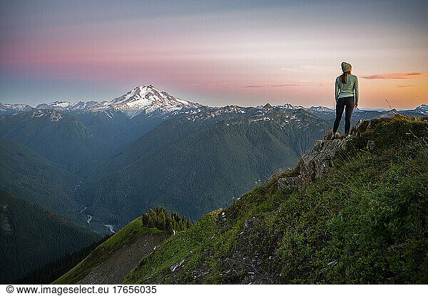 Female posing with Glacier Peak at Sunset