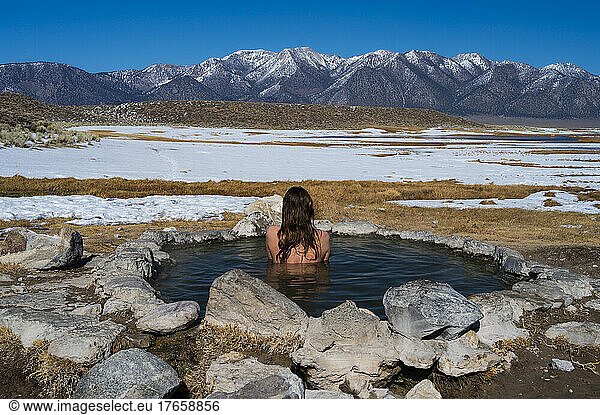 female-soaking-in-natural-hot-springs-female-soaking-in-natural-hot