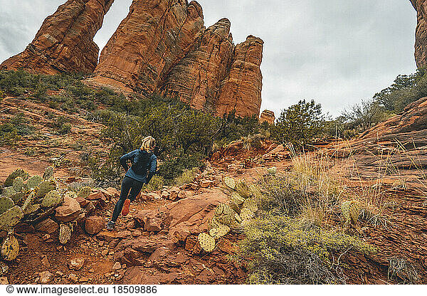 Female Trail Running to Top of Cathedral Rock
