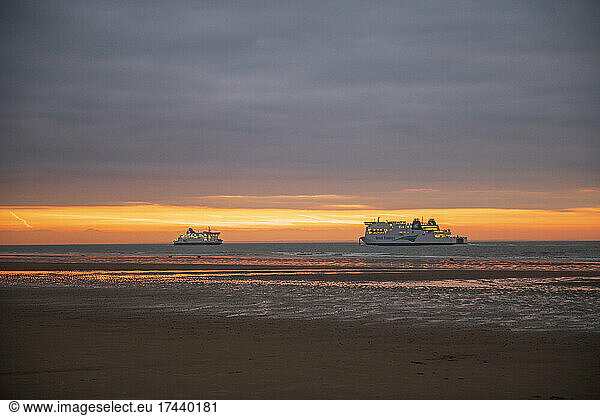 Ferries on the English Channel at sunset in summer  Opal Coast  Pas de Calais  France