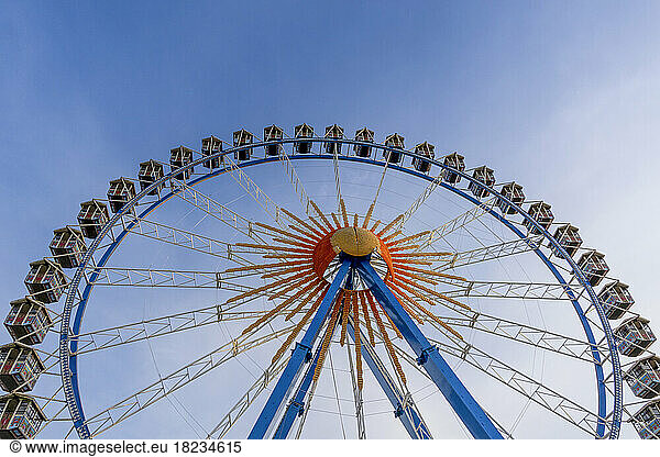 Ferris wheel under blue sky