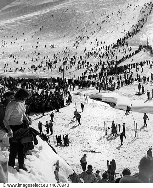 festivities  carnival  carnival on skis  skiers watching scene on slope  Firstalm  Schliersee  1957