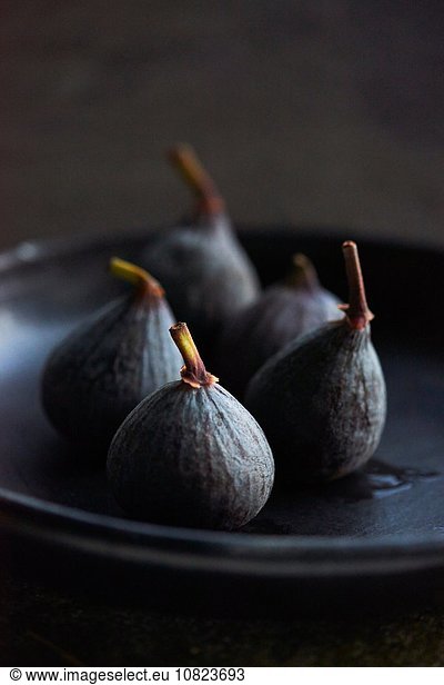 Figs on black plate