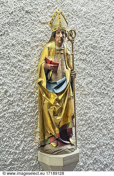 Figure of a saint with crosier and book  church St  Johann Baptist  Ismaning  Upper Bavaria  Bavaria  Germany  Europe