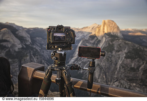 filming and photographing half dome from glacier point