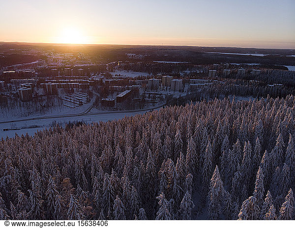 Finland  Kuopio  aerial view of winter landscape at sunset