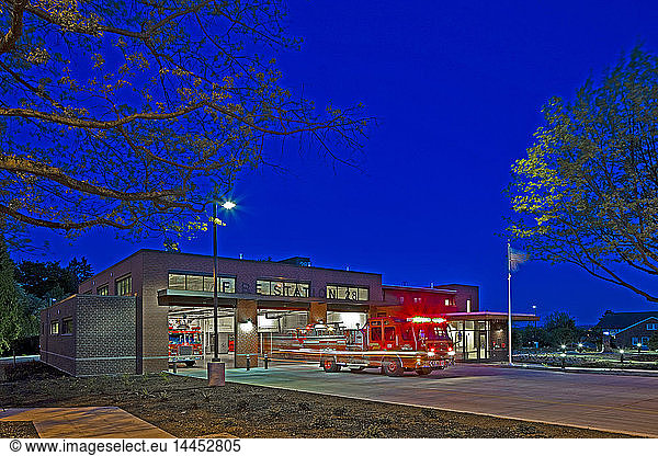 Fire Engine Leaving a Station at Night