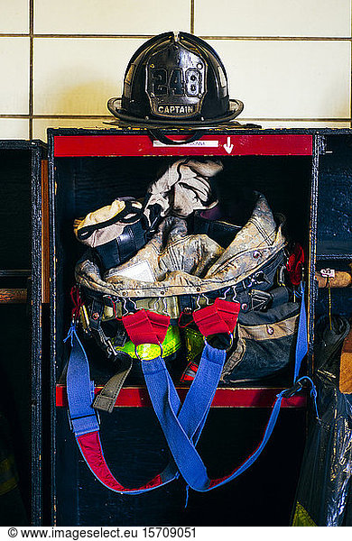 Firefighter helmet and equipment in fire station  New York  United States
