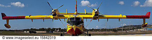 Firefighting propeller aircraft on apron at Luqa airfield in Malta