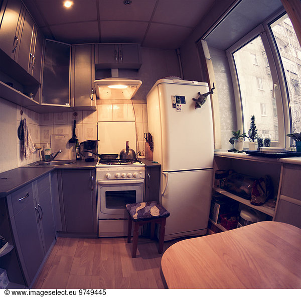 Fish-eye lens view of domestic kitchen