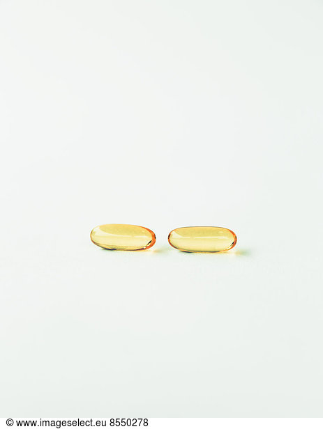 Fish oil providing Omega-3  in softgel supplement capsules  a health supplement and fatty acid often recommended for health.