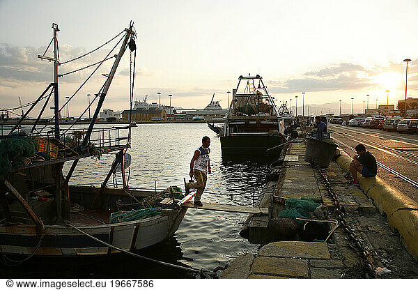 fishermen at the port  Italy.