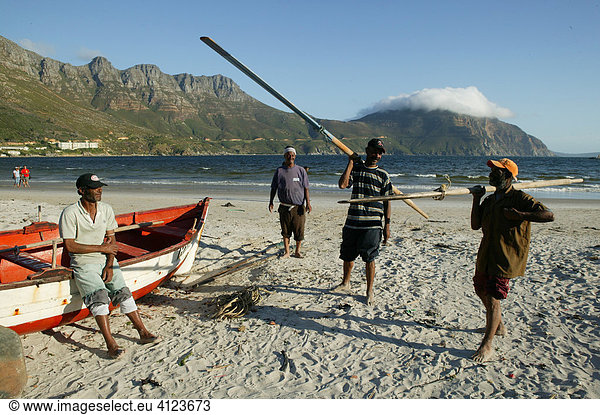 Fishers at the beach  Hout Bay near Cape Town   South Africa  Africa