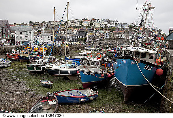 Fishing boats in harbour  Mevagissey  Cornwall  UK.