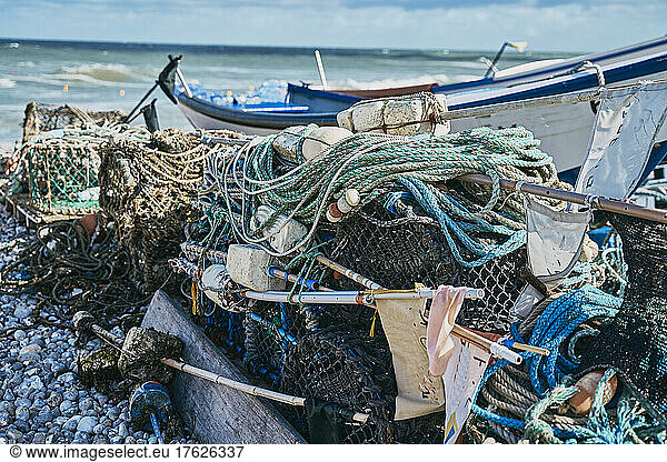 Fishing net and boat at beach