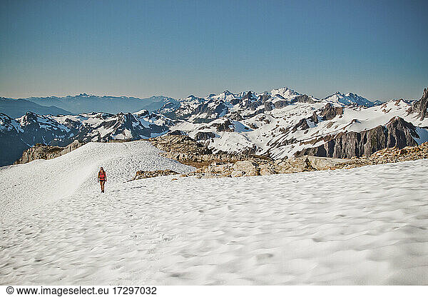 Fit active woman hiking on glacier in Whistler  B.C.  Canada.