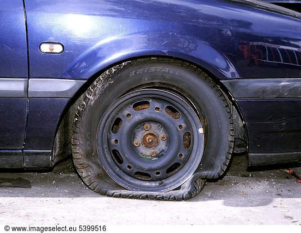 Flat tyre on a car involved in an accident