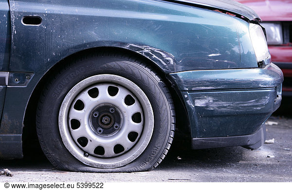 Flat tyre on a car involved in an accident