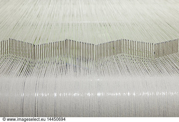 Flax Threads on a Loom