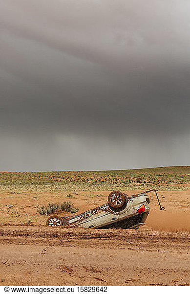 flipped upside down subaru outback off road near moab utah