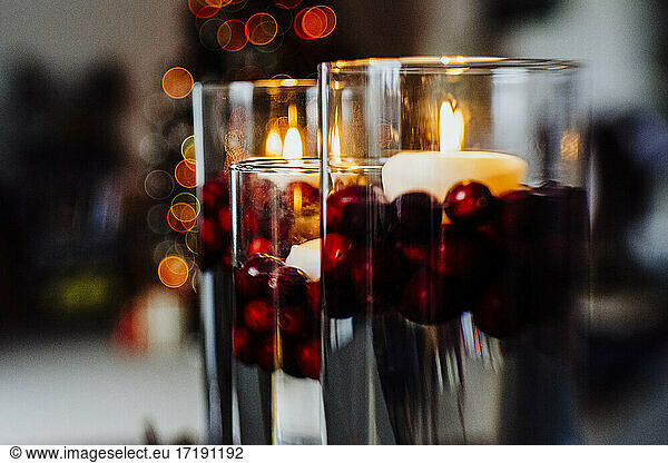 Floating Candles Floating in Hurricane Glass Vases