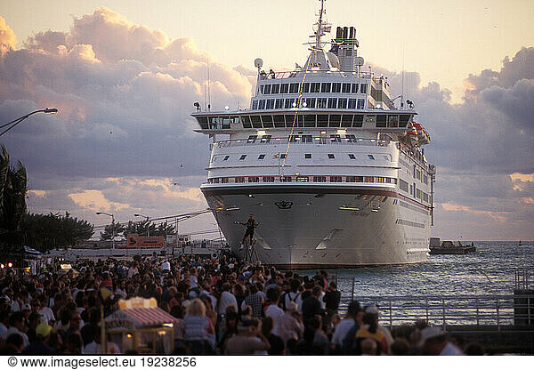 Florida  Key West  dense crowd on the promenade  a cruise ship has docked. Key West  December 1994.