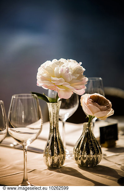 Flower Centrepieces on Table at Wedding Reception