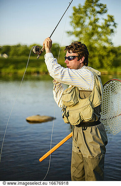Flyfishing at sunset on a Southeastern river