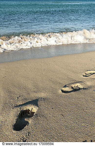 Footprints in beach sand