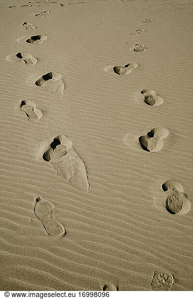 Footprints on sand beach