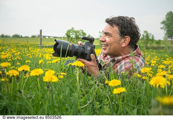 Fotograf im Feld