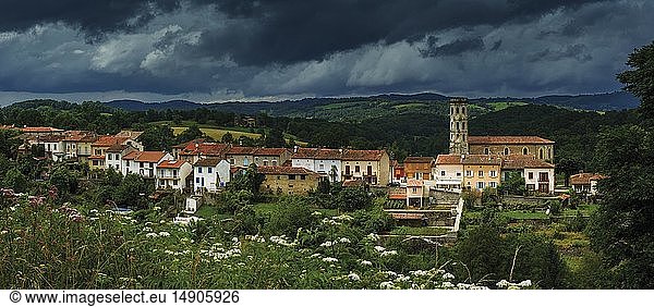 France,  Ariege,  Rimont,  village of the Piedmont Pyrenees under a sky of storms