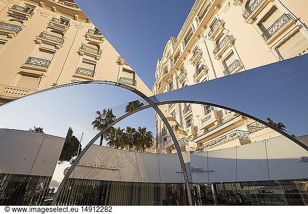 France  Alpes Maritimes  Cannes  façade of the Palais Miramar reflected on a modern work of art