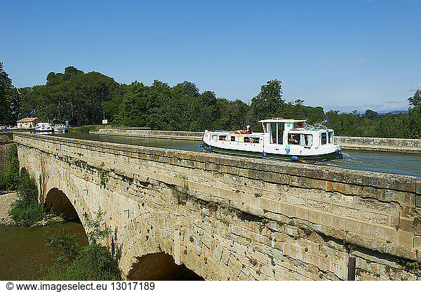 France  Aude  navigation on the Canal du Midi listed as World Heritage by UNESCO  between Carcassonne and Beziers  canal bridge of Cesse