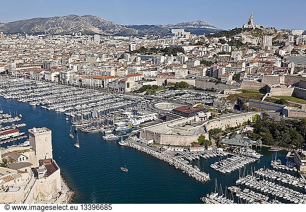 France  Bouches du Rhone  Marseille  Esplanade J4  MuCEM or Museum of Civilization in Europe and the Mediterranean  Fort St Jean  the Vieux Port (Old Harbour) and Notre Dame de la Garde (aerial view)