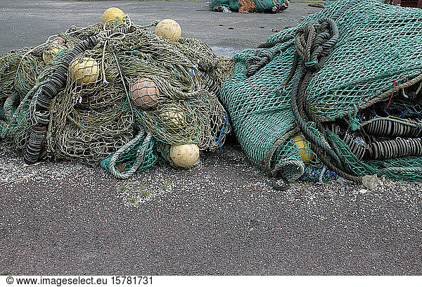 France  Brittany  Audierne  Fishing nets and buoys in harbor