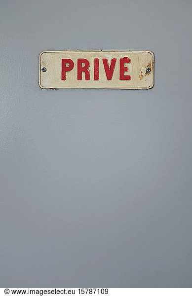 France  Brittany  Audierne  Retro private sign on gray surface