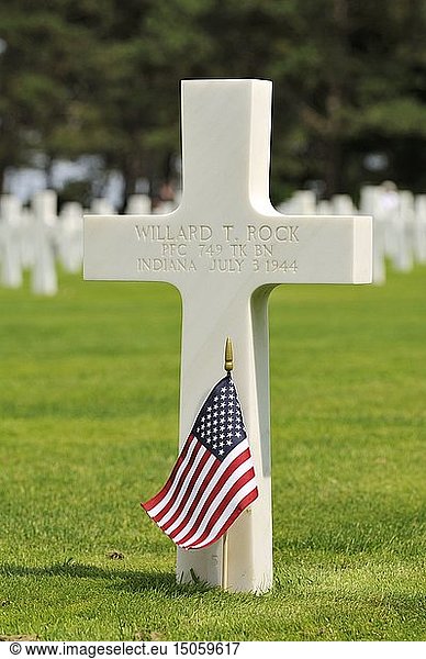 France  Calvados  Colleville sur Mer  Omaha Beach  the first US military cemetery of the Second World War  white marble cross where lie an American soldier