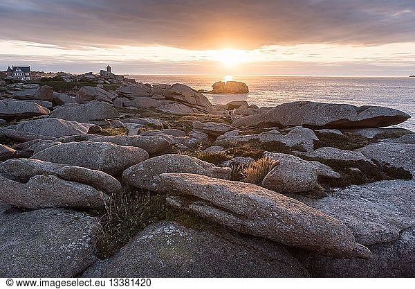 France  Cotes d'Armor  Cote de Granit Rose (Pink Granite Coast)  Perros Guirec  Ploumanac'h  advanced Squewel and the lighthouse of Mean Ruz at sunset