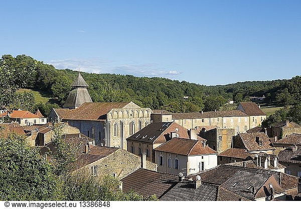 France  Dordogne  Perigord Noir  Le Buisson de Cadouin  panoramic view of the village and the former cistercian abbey church  stage on the Compstella route listed as World Heritage by UNESCO  people disguised