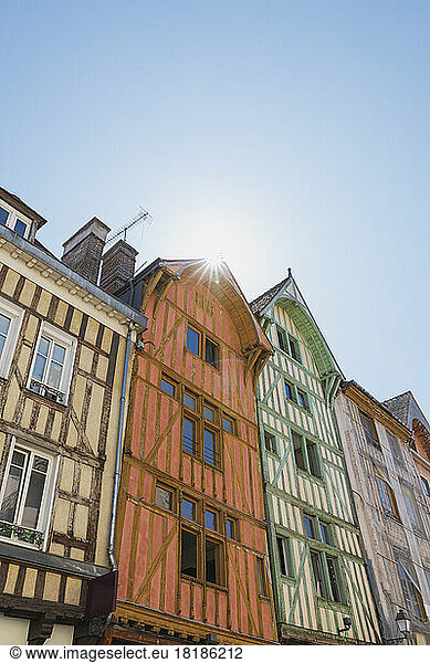 France  Grand Est  Troyes  Sun shining over historic half-timbered row houses