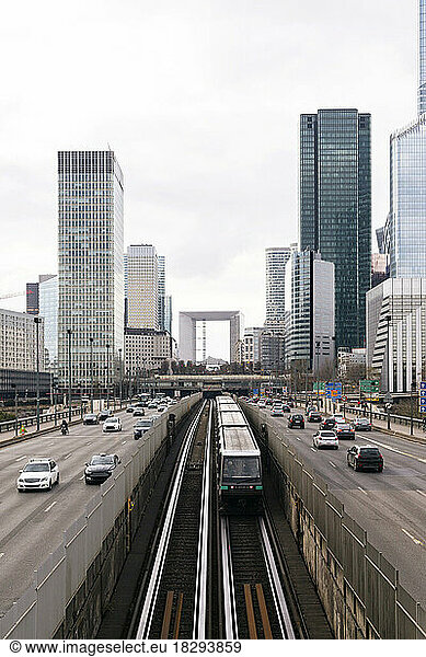 France  Ile-de-France  Paris  City traffic with skyscrapers of La Defense district in background