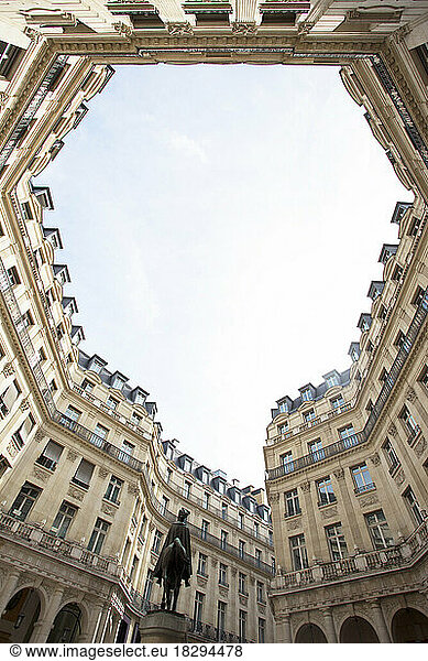 France  Ile-de-France  Paris  Low angle view of apartments surrounding Square Edouard-VII