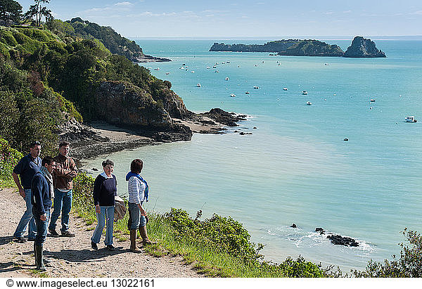 France  Ille et Vilaine  Cote d'Emeraude (Emerald Coast)  Cancale  group of walkers