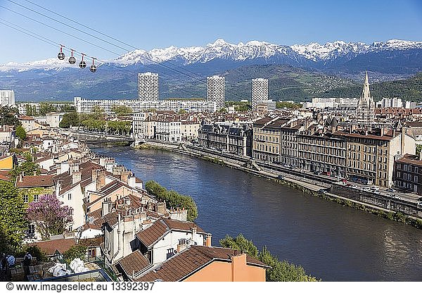 France  Isere  Grenoble  view of Grenoble-Bastille cable car and its Bubbles  the oldest city cable car in the world  view of the 13th century Saint Andre church and Belledonne massif
